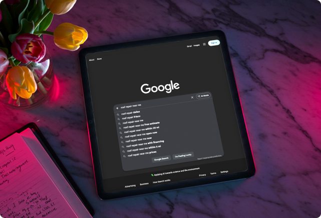 Tablet showing Google search suggestions for roof repair near me