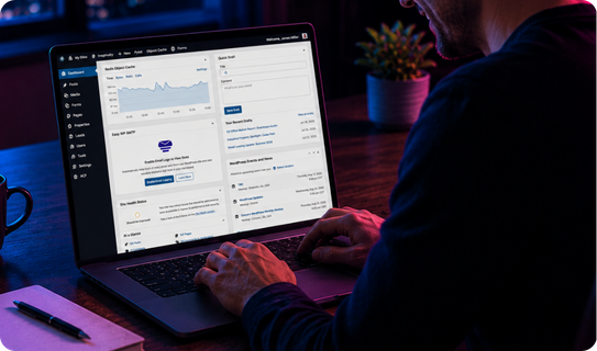 Person reviewing a website analytics dashboard on a laptop